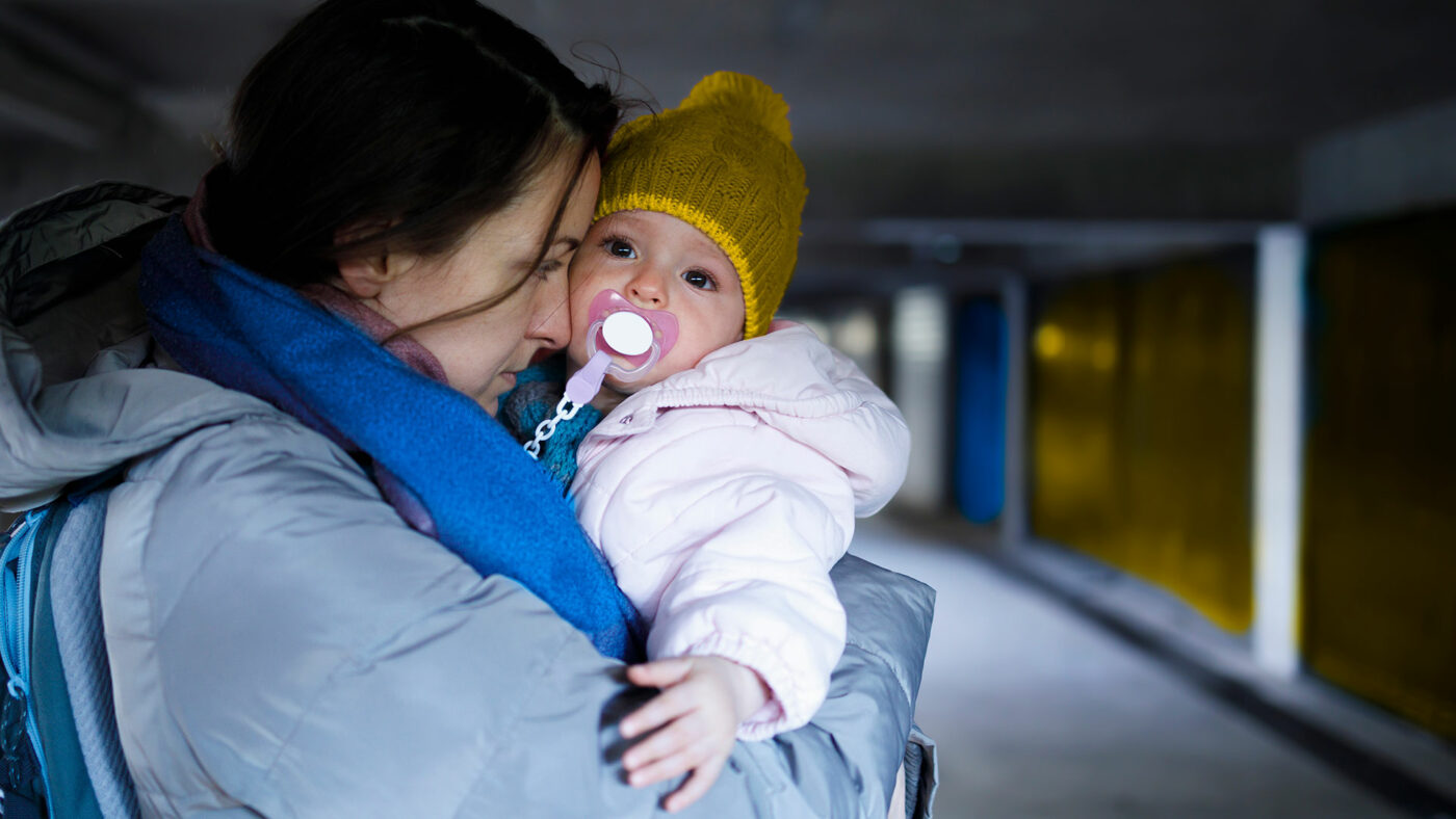 Mother with child in the street